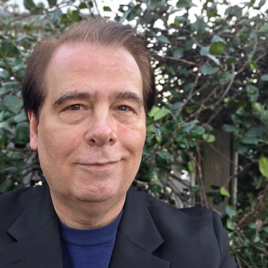 Toby Martini outdoors in a dark jacket.